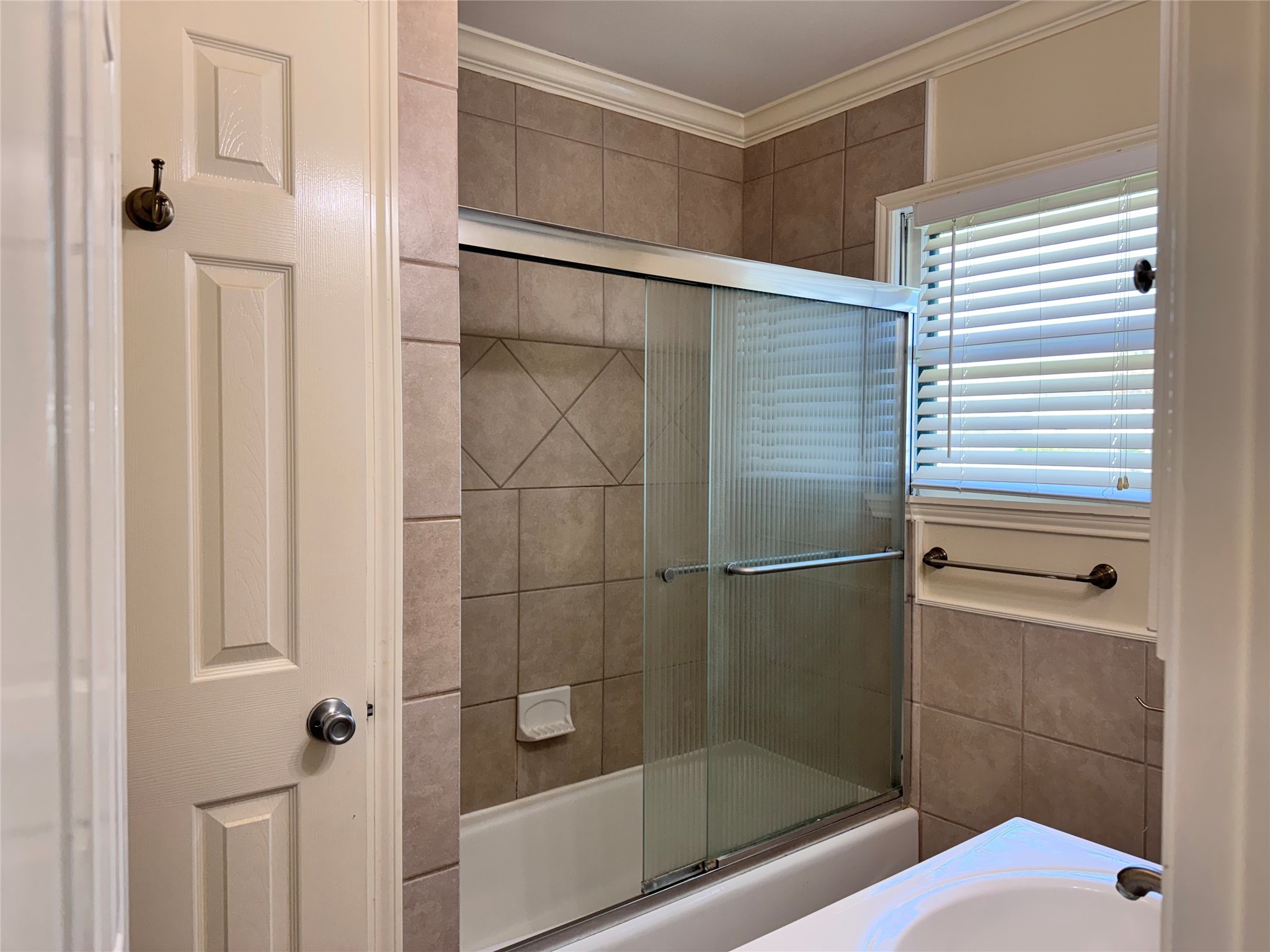 2515 Broome Road Galveston, TX 77554 - Photo 11 of 13 a bathroom with a shower