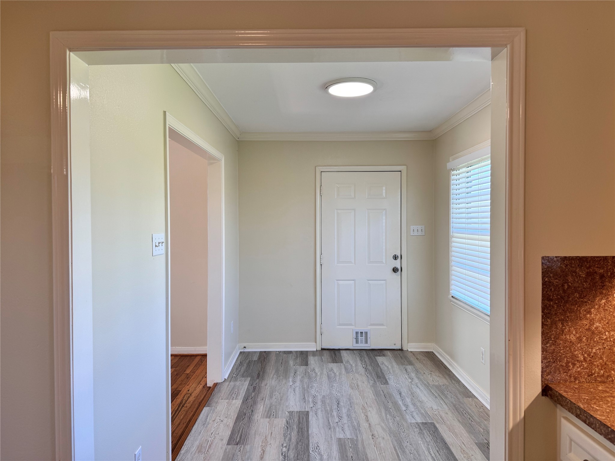 2515 Broome Road Galveston, TX 77554 - Photo 12 of 13 a view of hallway with wooden floor