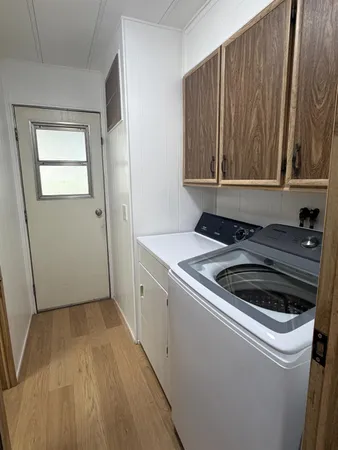 a kitchen that has a sink and a stove