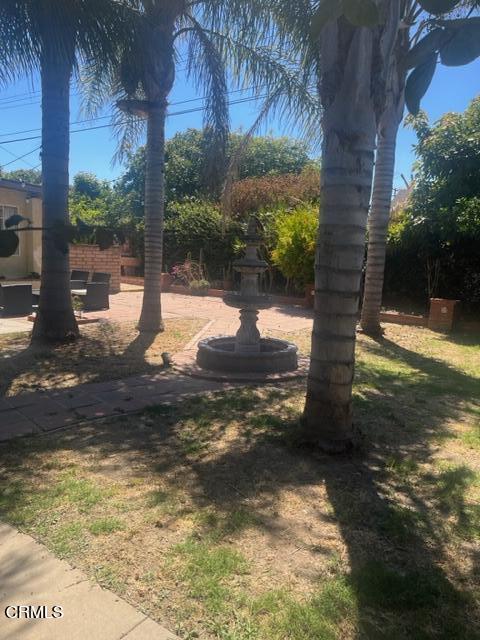 2065 Ironbark Drive Oxnard, CA 93036 - Photo 17 of 17 a view of a yard with wooden fence