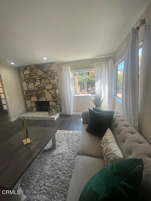 2065 Ironbark Drive Oxnard, CA 93036 - Photo 3 of 17 a living room with furniture and a fireplace