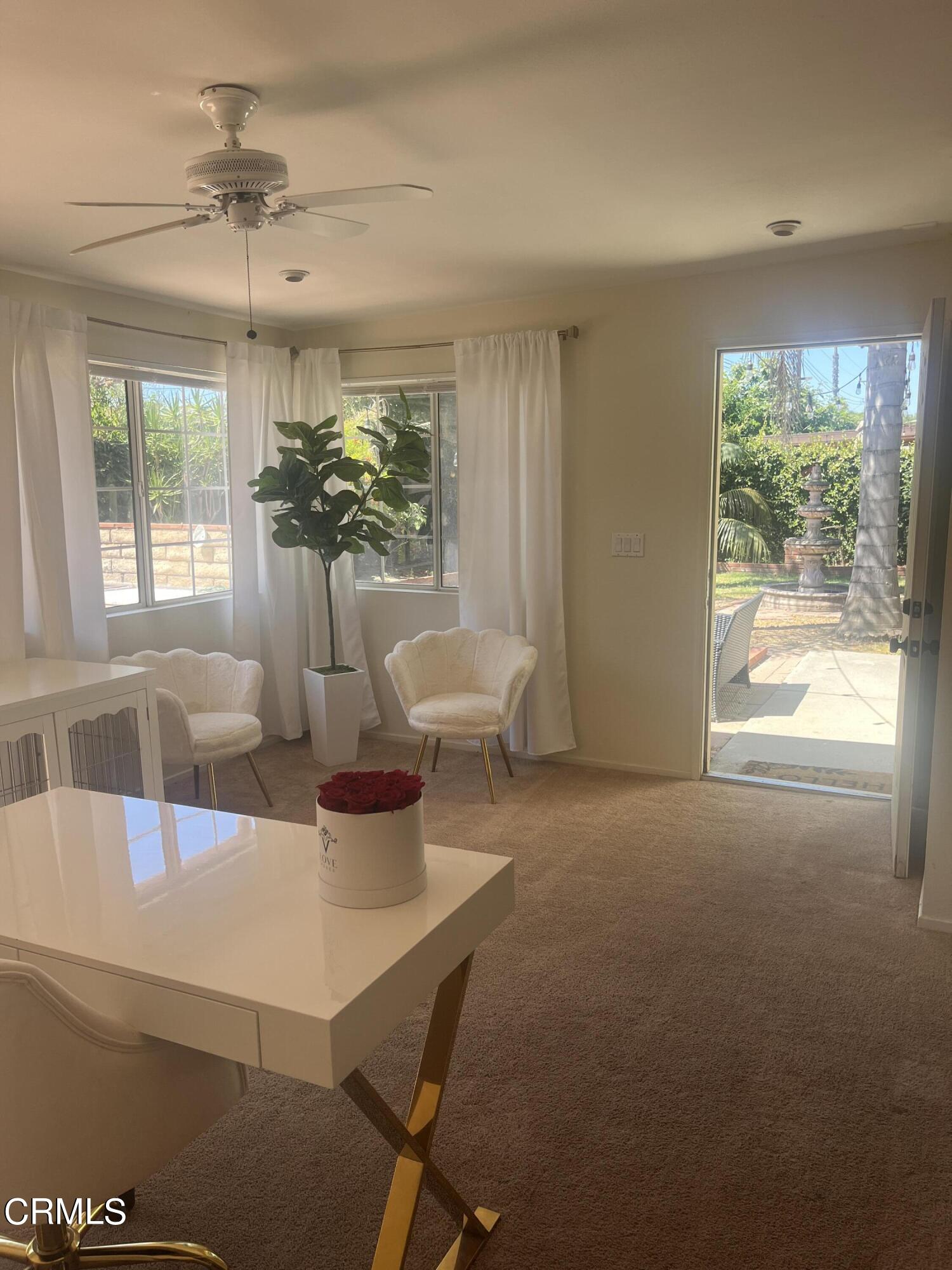 2065 Ironbark Drive Oxnard, CA 93036 - Photo 7 of 17 a view of a dining room with furniture and window