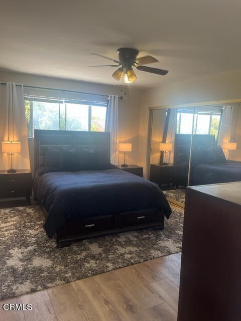 2065 Ironbark Drive Oxnard, CA 93036 - Photo 9 of 17 a bedroom with a large bed and a large window