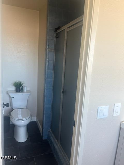 2065 Ironbark Drive Oxnard, CA 93036 - Photo 10 of 17 a white toilet sitting next to a shower
