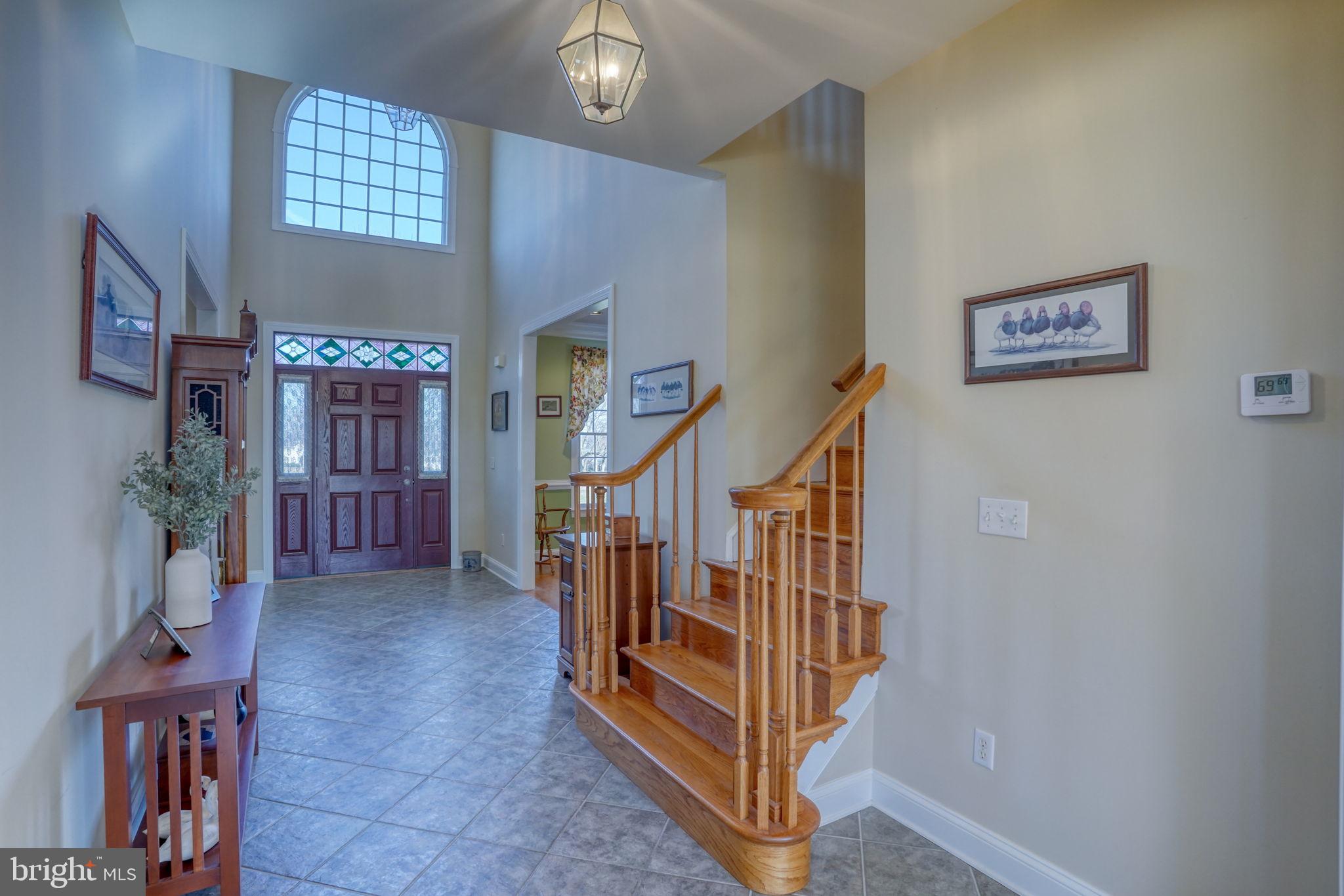 532 Stoney Battery Road Earleville, MD 21919 - Photo 14 of 84 Two-story ceramic tiled foyer
