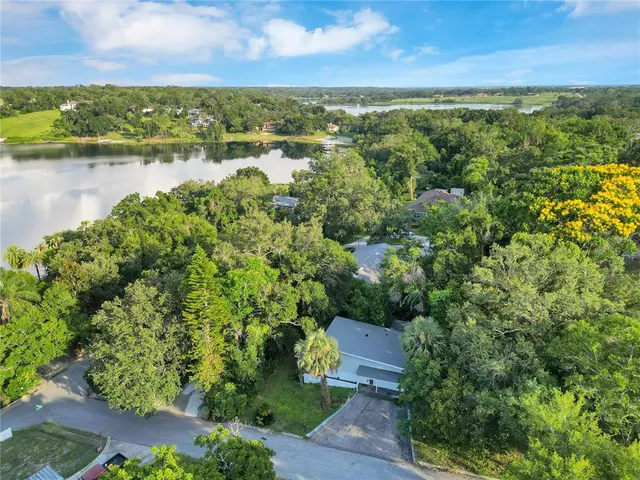 a view of a lake with a yard