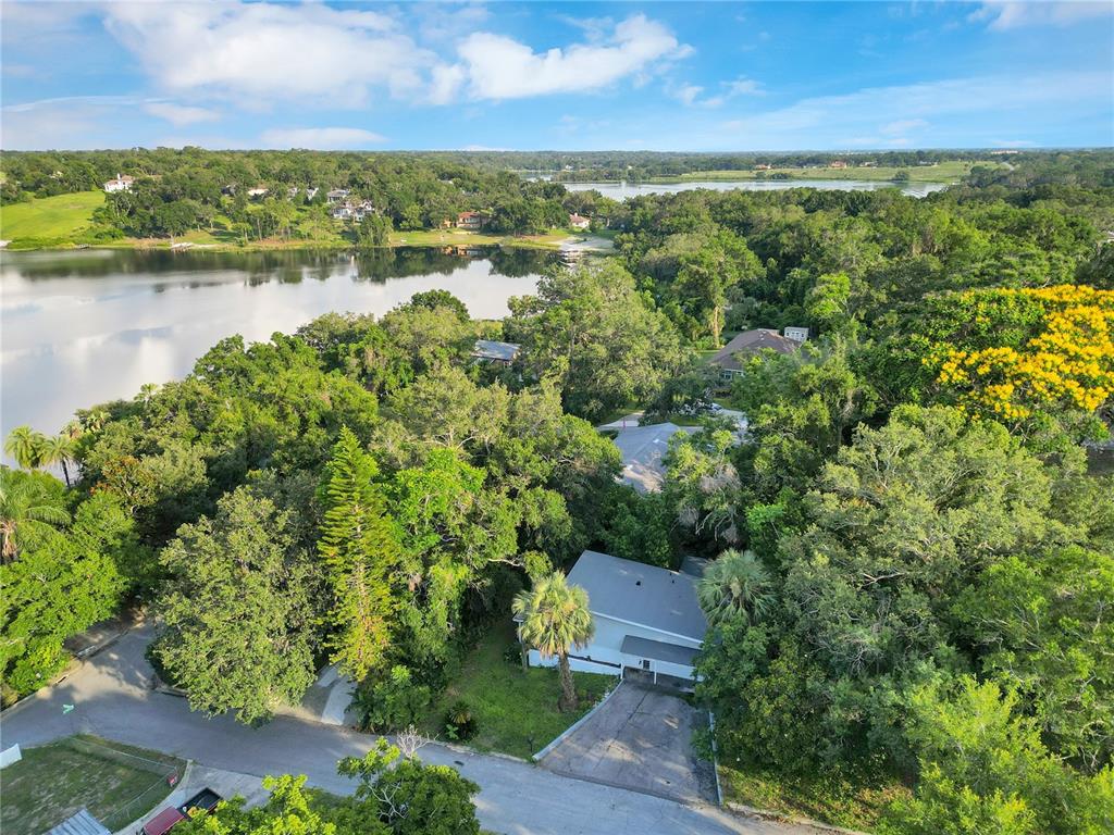 a view of a lake with a yard