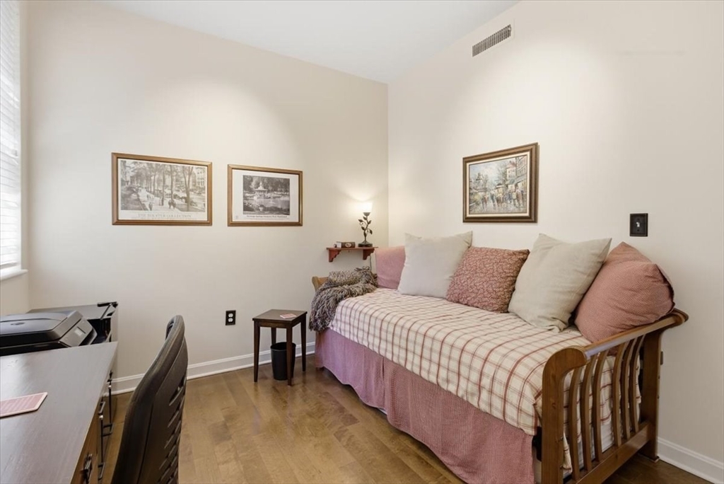 65 Glen Road, Unit H1 Brookline, MA 02445 - Photo 28 of 39 a bedroom with a bed and a desk