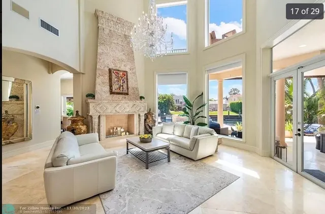 a living room with fireplace furniture and a fireplace