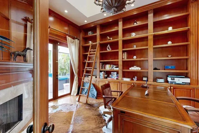 a room with furniture and a fireplace