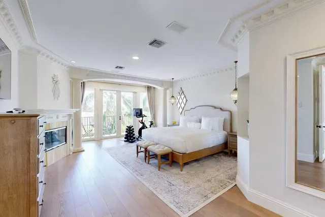 a bed room with furniture and a fireplace