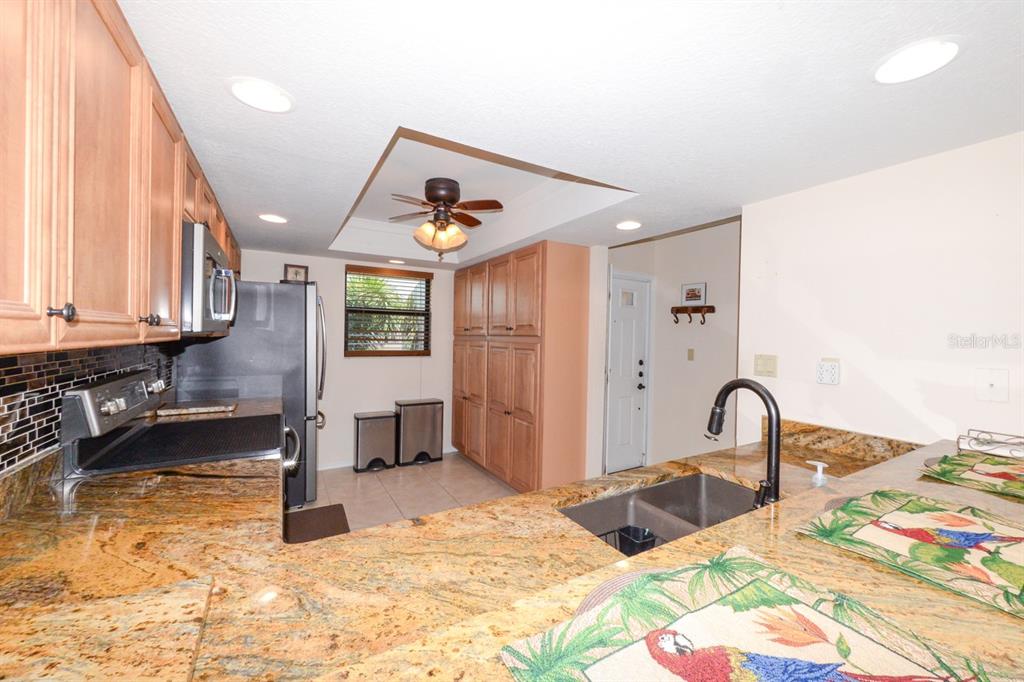 335 Coldeway Drive, Unit F21 Punta Gorda, FL 33950 - Photo 4 of 45 a bedroom with a bed and a sink