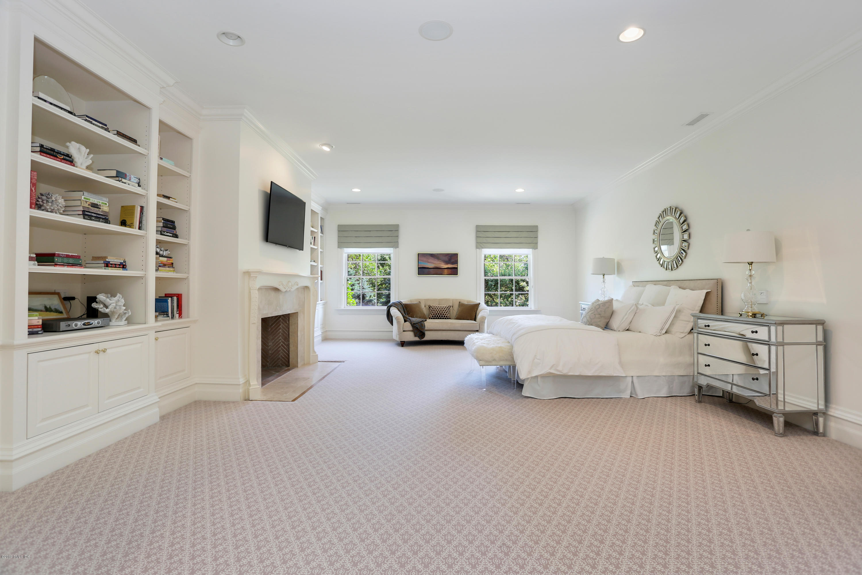 15 Knollwood Drive Greenwich, CT 06830 - Photo 11 of 30 a living room with furniture white walls and white walls