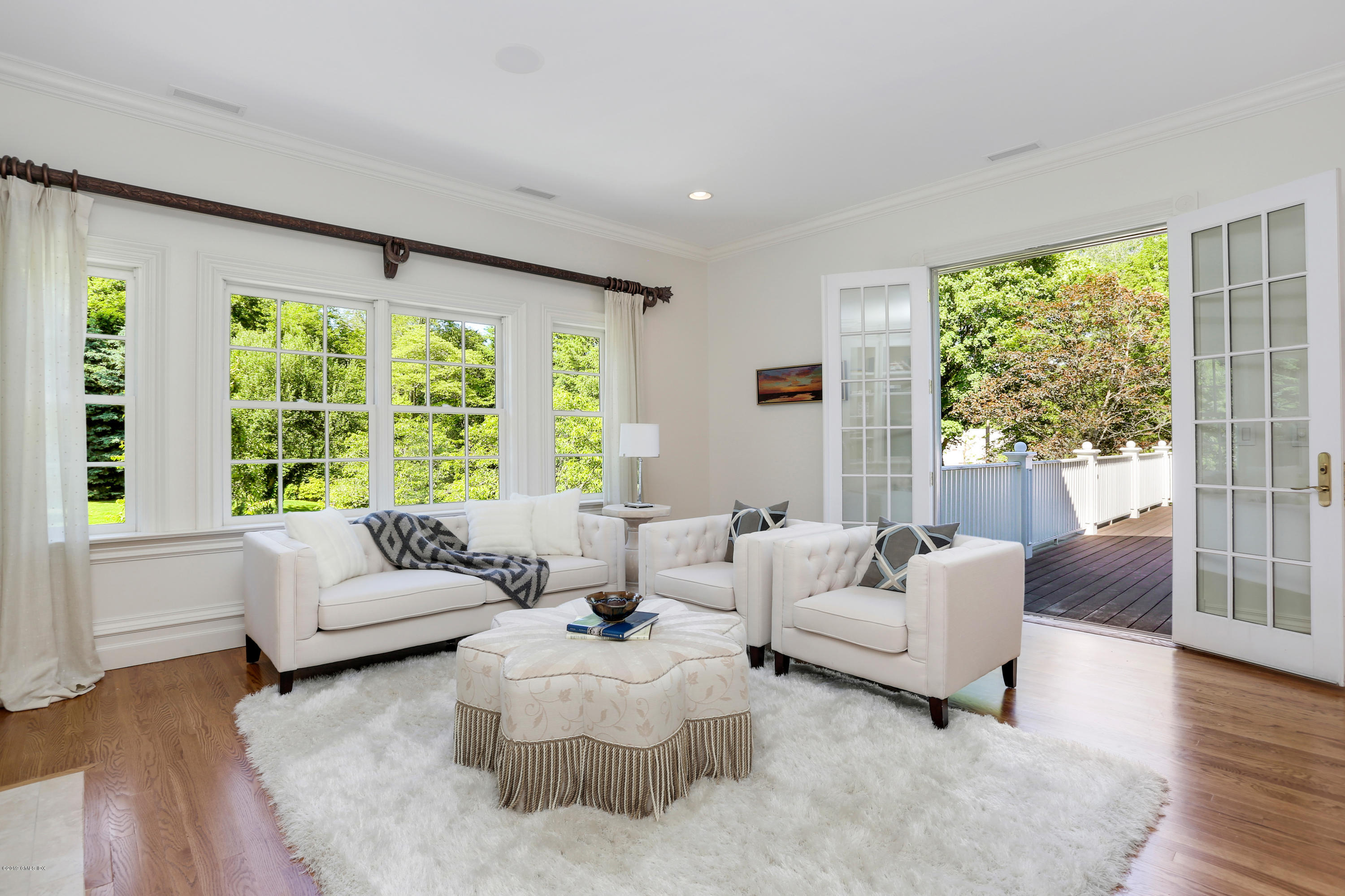 15 Knollwood Drive Greenwich, CT 06830 - Photo 13 of 30 a living room with furniture and a large window