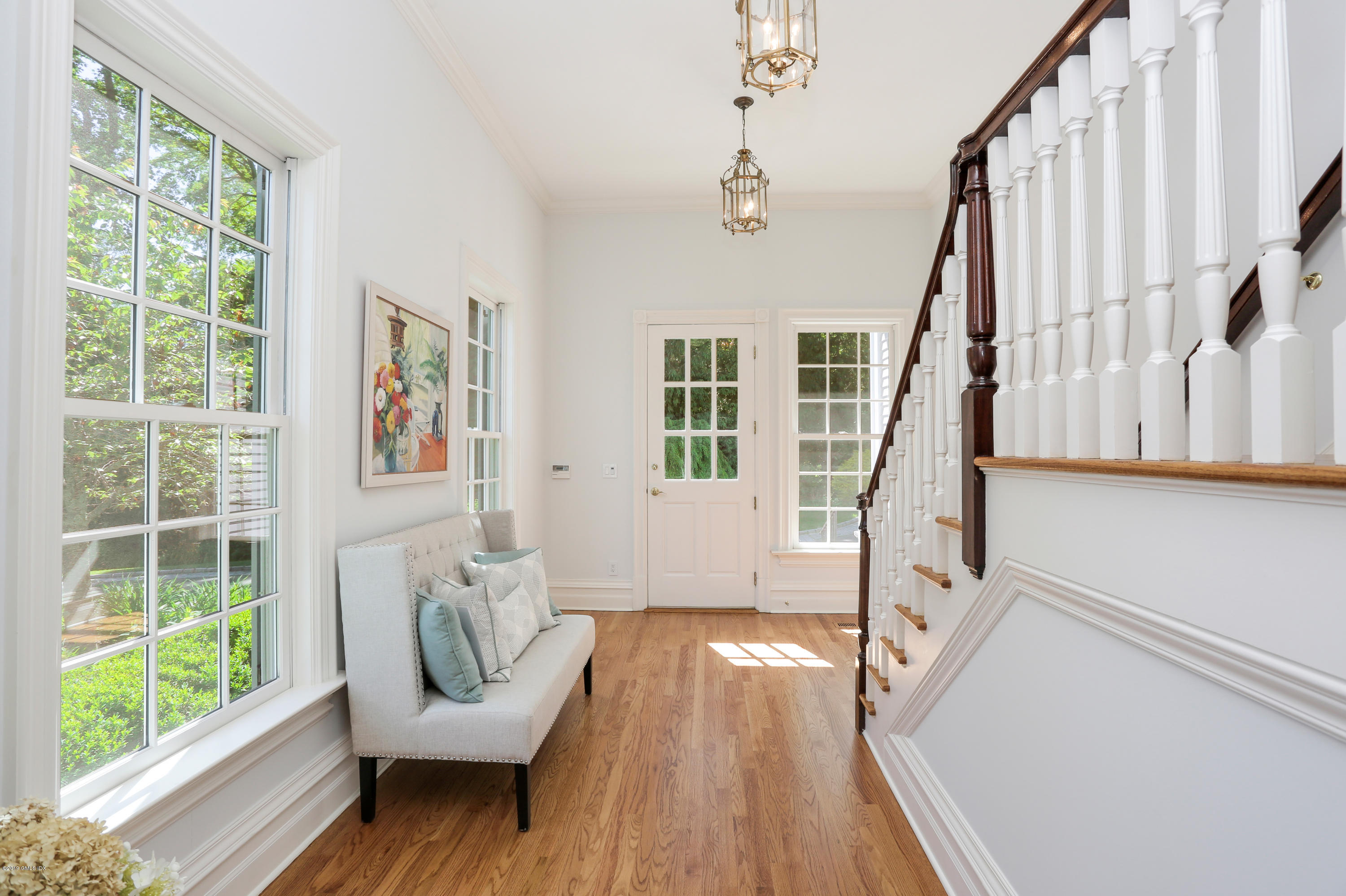 15 Knollwood Drive Greenwich, CT 06830 - Photo 21 of 30 a living room with furniture and a wooden floor