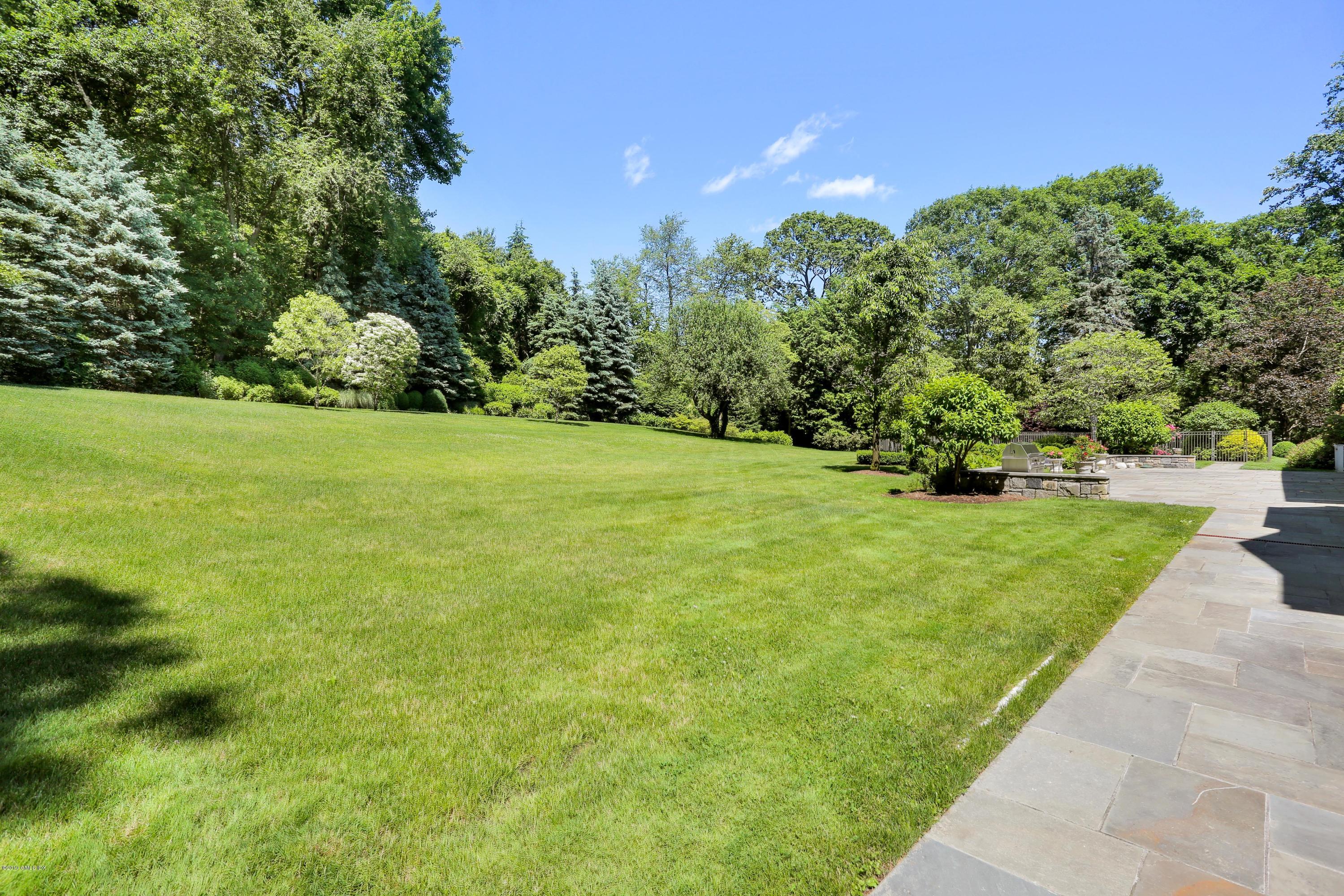 15 Knollwood Drive Greenwich, CT 06830 - Photo 26 of 30 a view of field with trees in the background