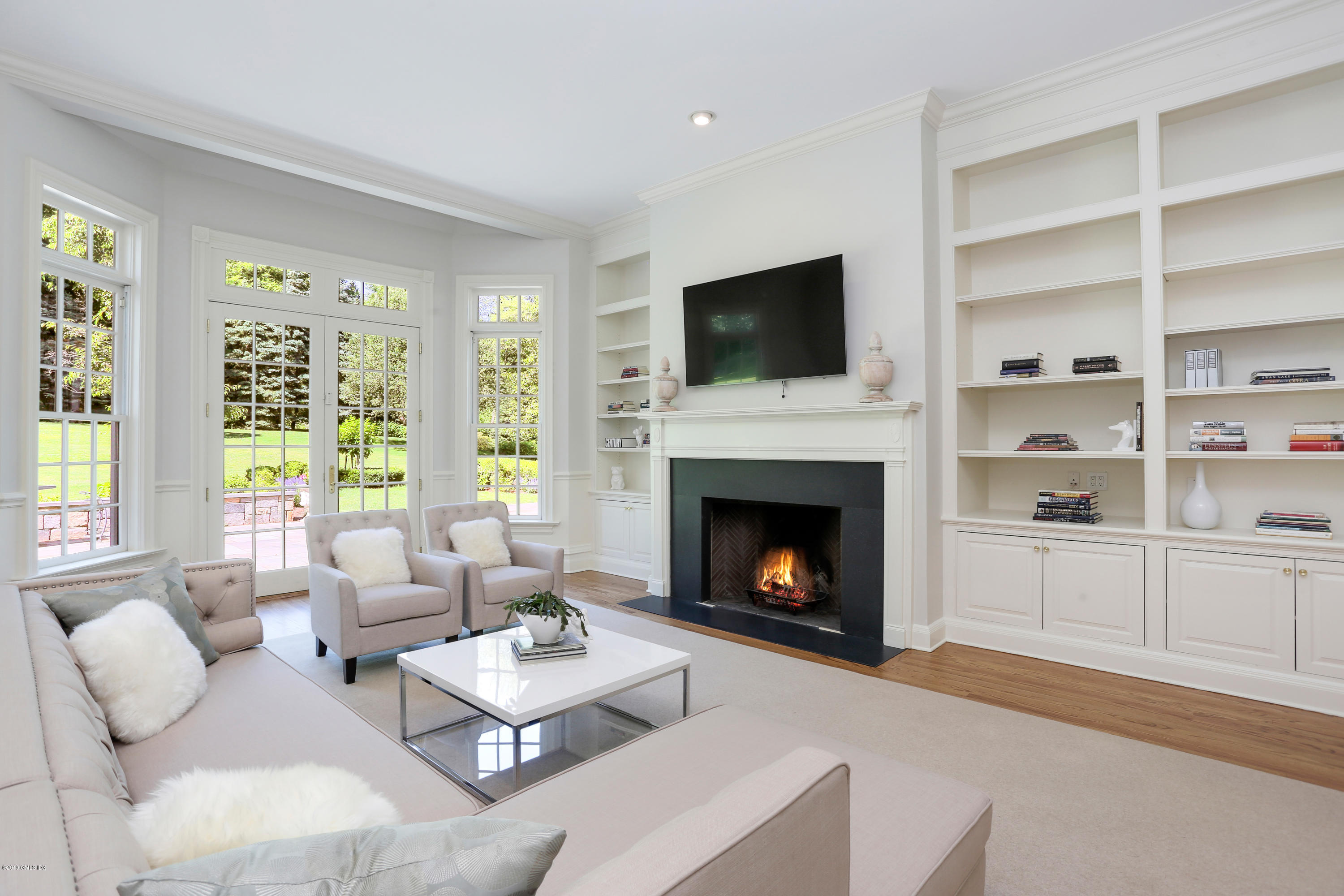15 Knollwood Drive Greenwich, CT 06830 - Photo 6 of 30 a living room with furniture fireplace and window