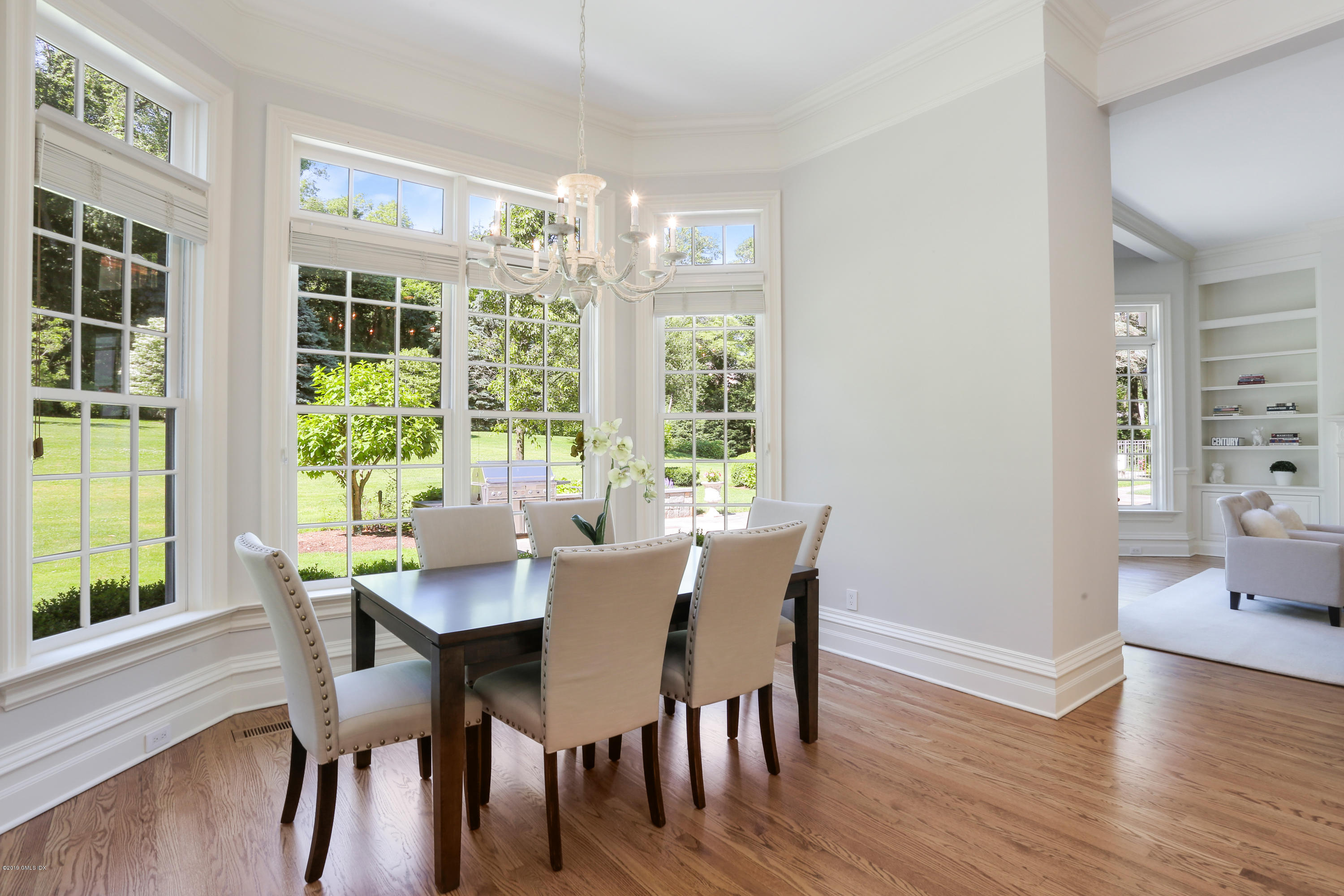 15 Knollwood Drive Greenwich, CT 06830 - Photo 9 of 30 a view of a dining room with furniture window and wooden floor