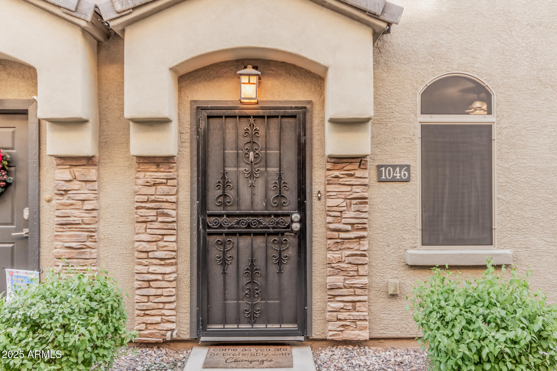 1350 South Greenfield Road, Unit 1046 Mesa, AZ 85206 - Photo 3 of 35 a view of front door of house