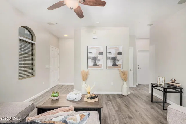 a living room with furniture and window