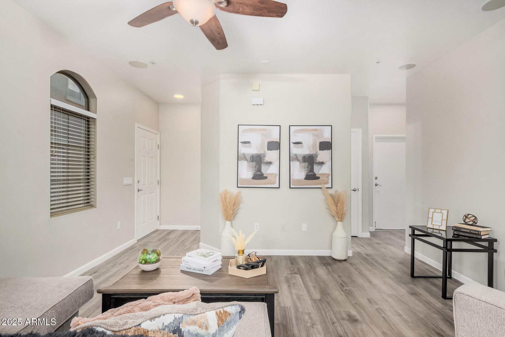 1350 South Greenfield Road, Unit 1046 Mesa, AZ 85206 - Photo 7 of 35 a living room with furniture and window