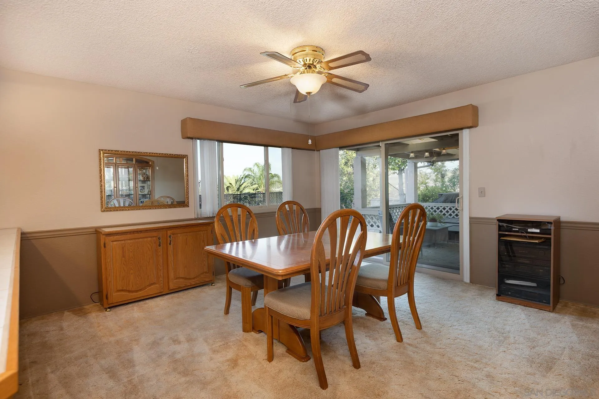 12455 Ridgeton Drive Lakeside, CA 92040 - Photo 9 of 31 a view of a dining room with furniture window and outside view