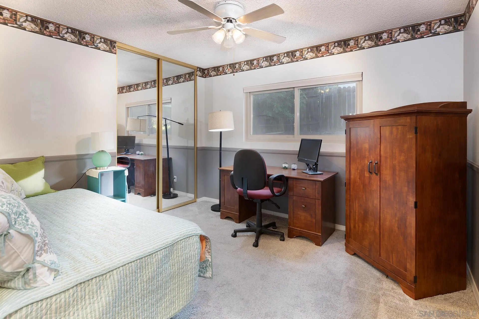 12455 Ridgeton Drive Lakeside, CA 92040 - Photo 10 of 31 a bedroom with a bed and furniture