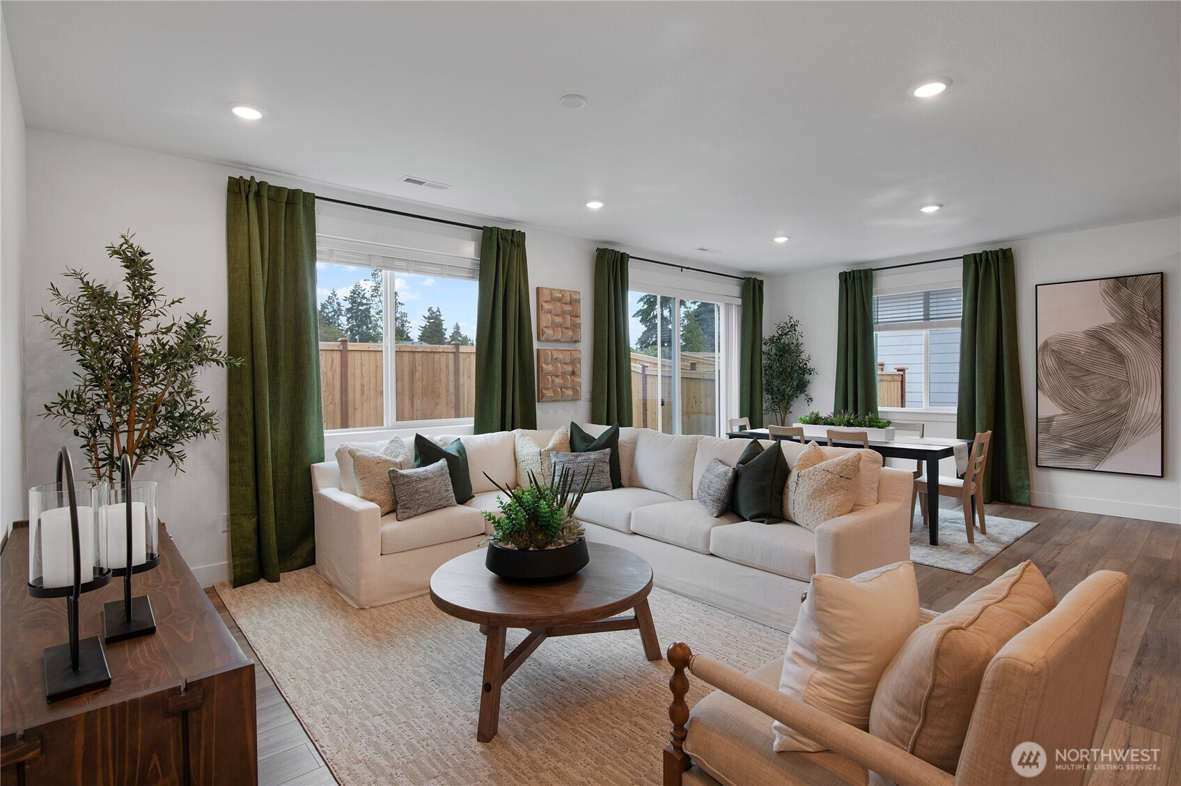602 Gooseberry Place Sequim, WA 98382 - Photo 8 of 21 a living room with furniture and a potted plant
