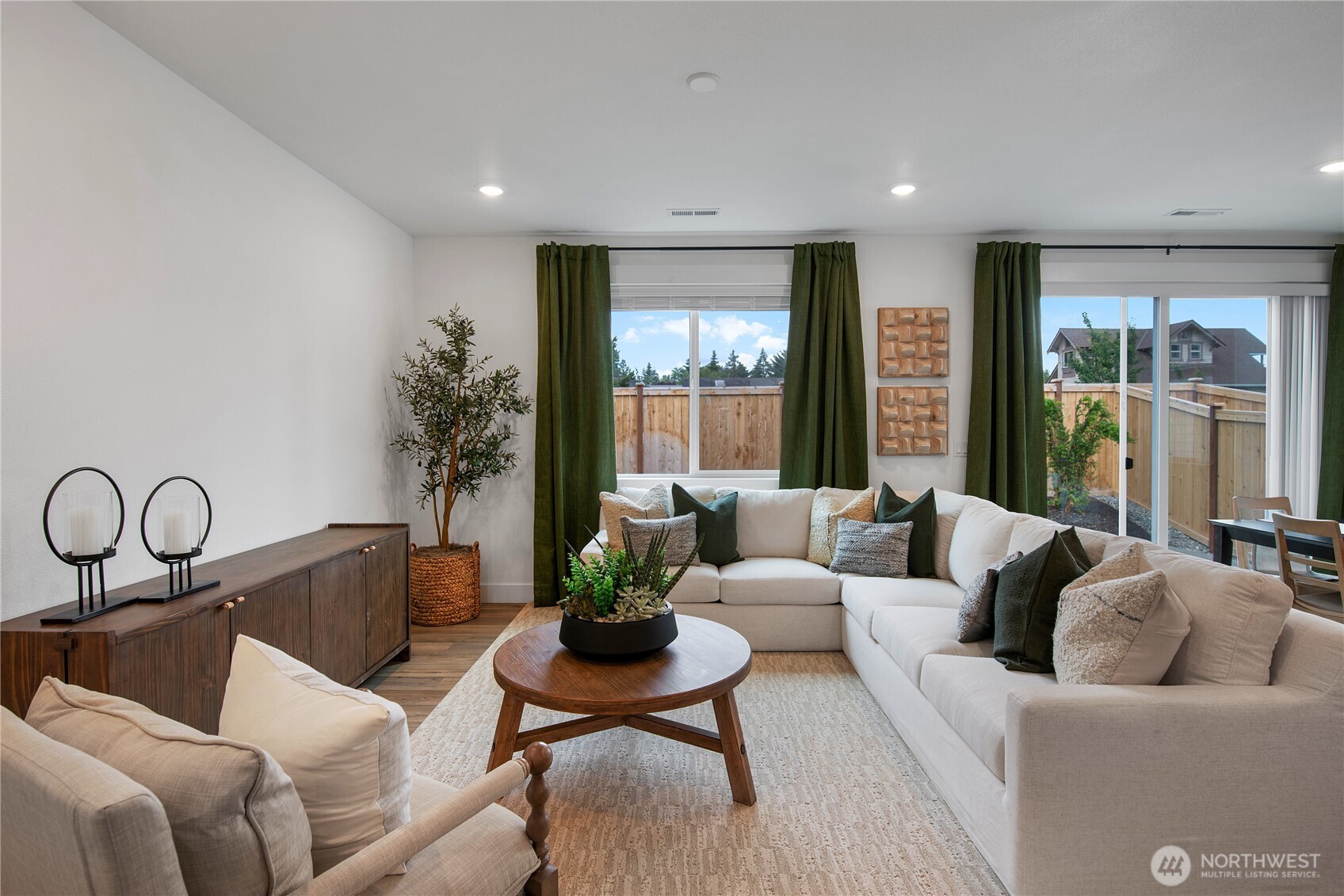 602 Gooseberry Place Sequim, WA 98382 - Photo 9 of 21 a living room with furniture and a large window