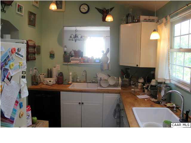 881 Ridge Street Charlottesville, VA 22902 - Photo 5 of 16 a kitchen with a sink and cabinets