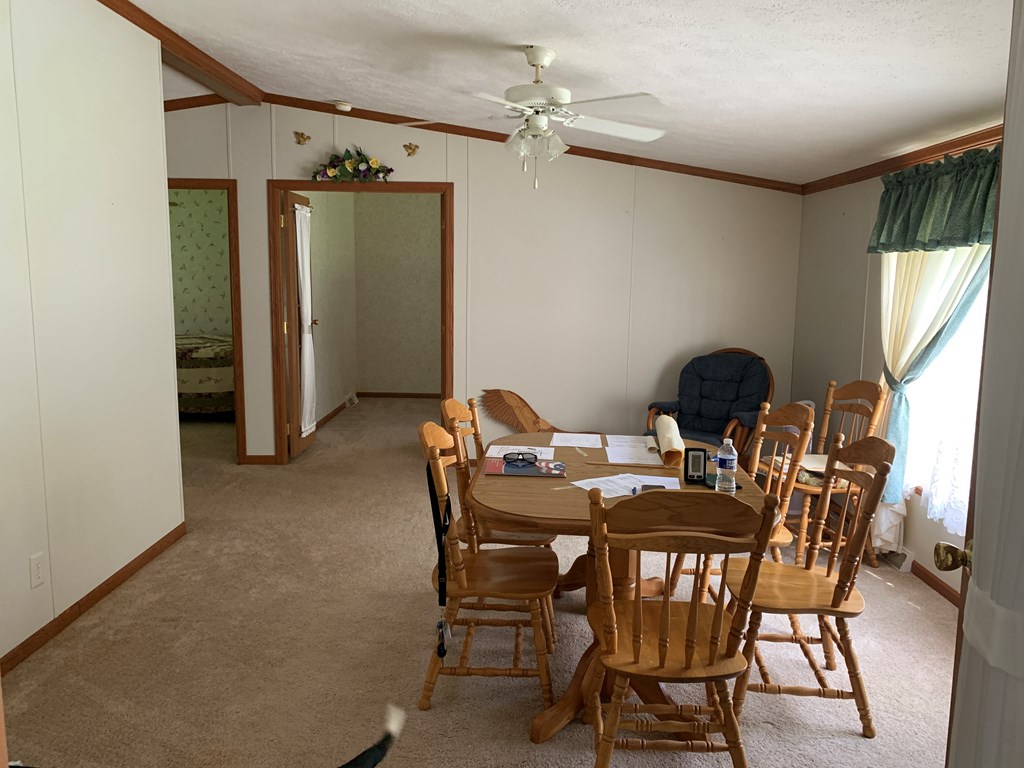 3870 Georgetown Road Polk, PA 16342 - Photo 21 of 42 a dining room with furniture and window
