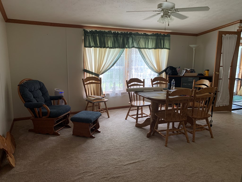 3870 Georgetown Road Polk, PA 16342 - Photo 22 of 42 a view of a livingroom with furniture and a window