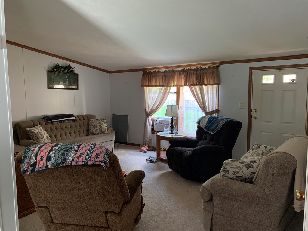 3870 Georgetown Road Polk, PA 16342 - Photo 23 of 42 a living room with furniture and a large window