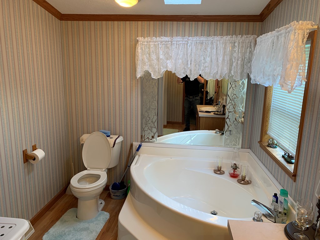 3870 Georgetown Road Polk, PA 16342 - Photo 28 of 42 a bathroom with a sink toilet and shower