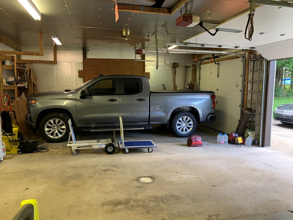 3870 Georgetown Road Polk, PA 16342 - Photo 9 of 42 a view of a garage with car parked