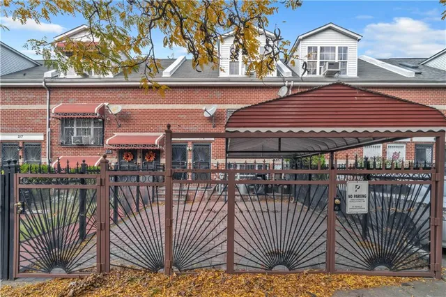 an outdoor view of a house with balcony