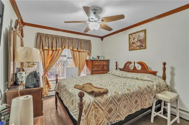 a bedroom with a bed and a table