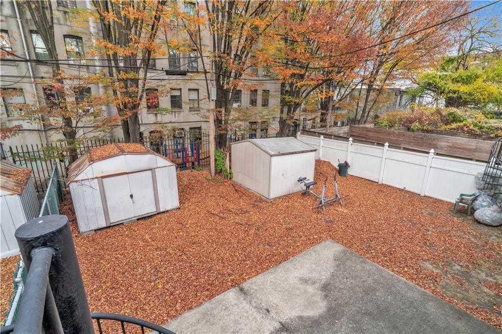 221 MacDougal Street Brooklyn, NY 11233 - Photo 19 of 23 a view of a swimming pool with an outdoor seating