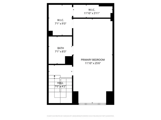 a picture of a bench in front of a wall