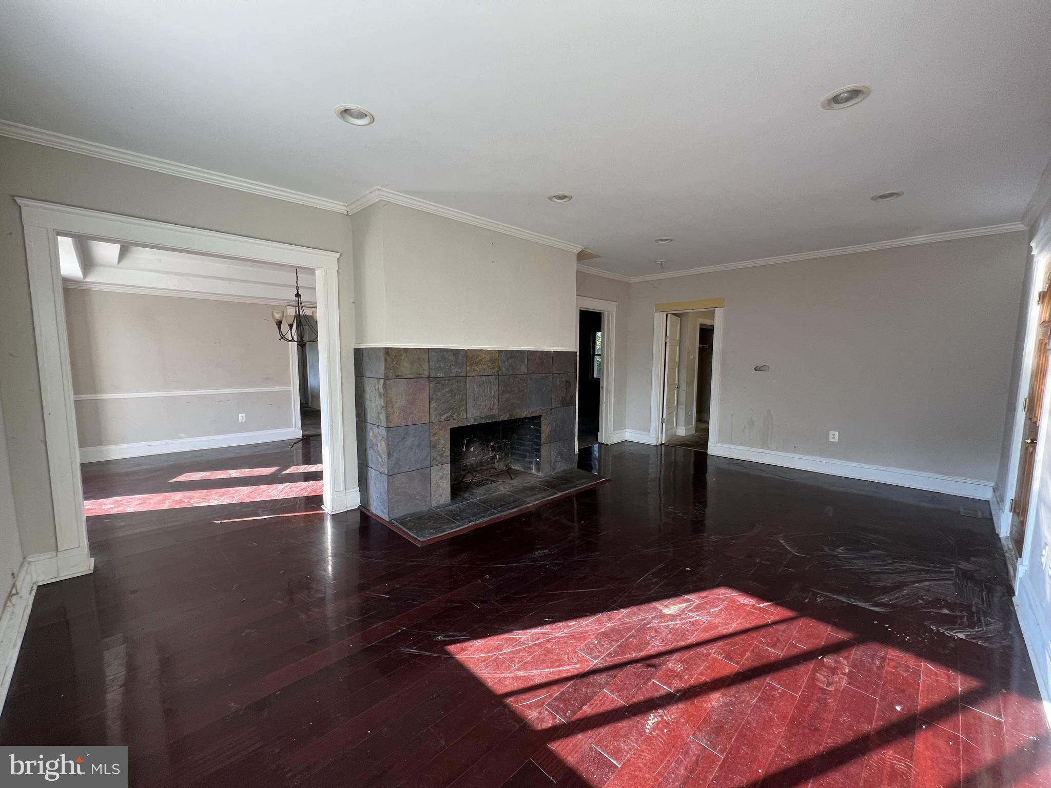 4017 Ridgewood Avenue Baltimore, MD 21215 - Photo 3 of 27 Living room. Wood burning fireplace