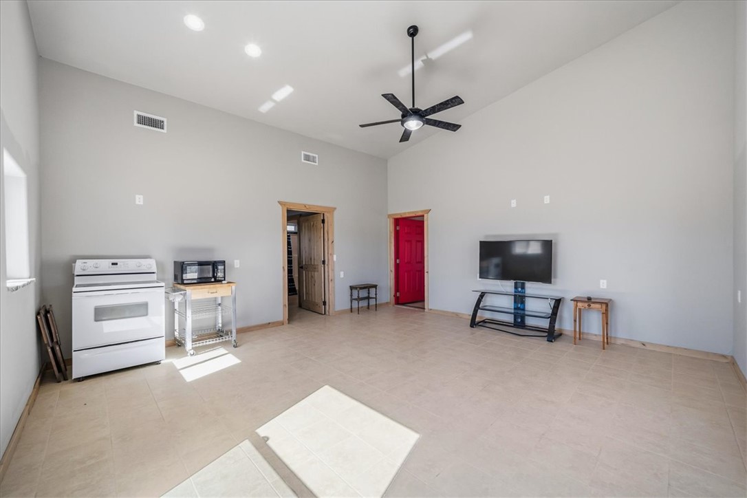 10374 East Happy Trails Road Kingman, AZ 86401 - Photo 23 of 68 a view of work space with furniture and windows