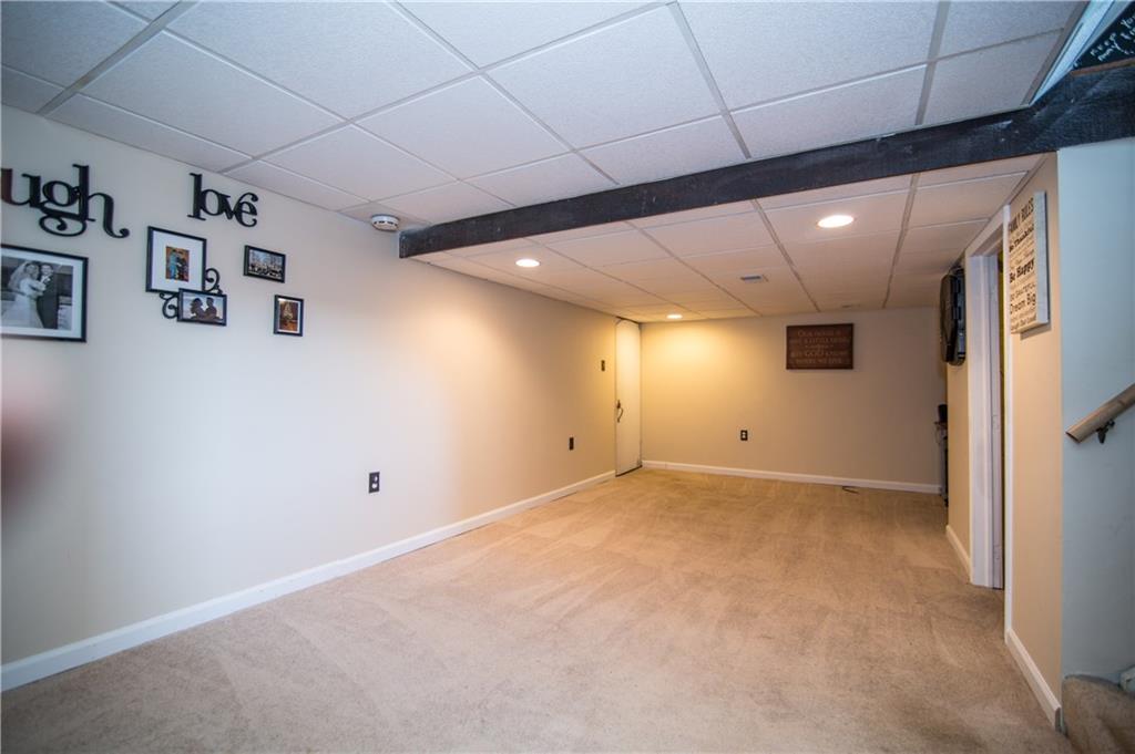 1032 Silver Lane McKees Rocks, PA 15136 - Photo 14 of 21 The finished basement offers a great space to play or relax.