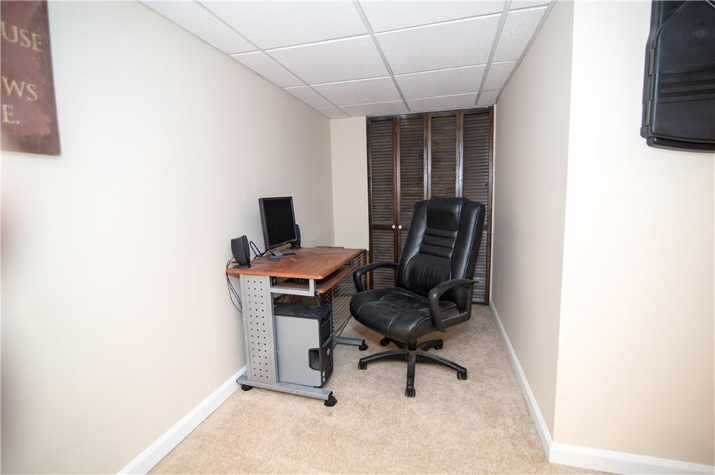 1032 Silver Lane McKees Rocks, PA 15136 - Photo 16 of 21 This section of the basement provides a great space for an office area.