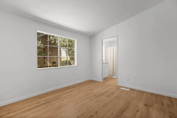 a kitchen with stainless steel appliances a refrigerator sink and stove