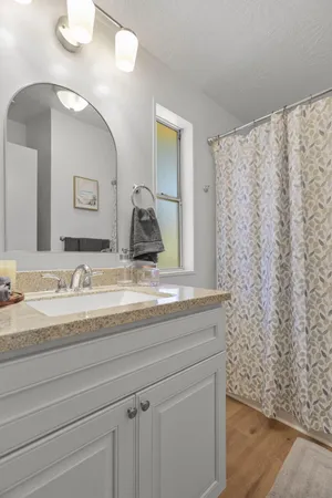 a kitchen with appliances cabinets and a sink