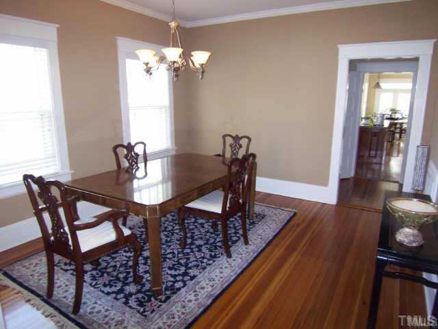 1708 Dare Street Raleigh, NC 27608 - Photo 3 of 9 a dining room with furniture and wooden floor