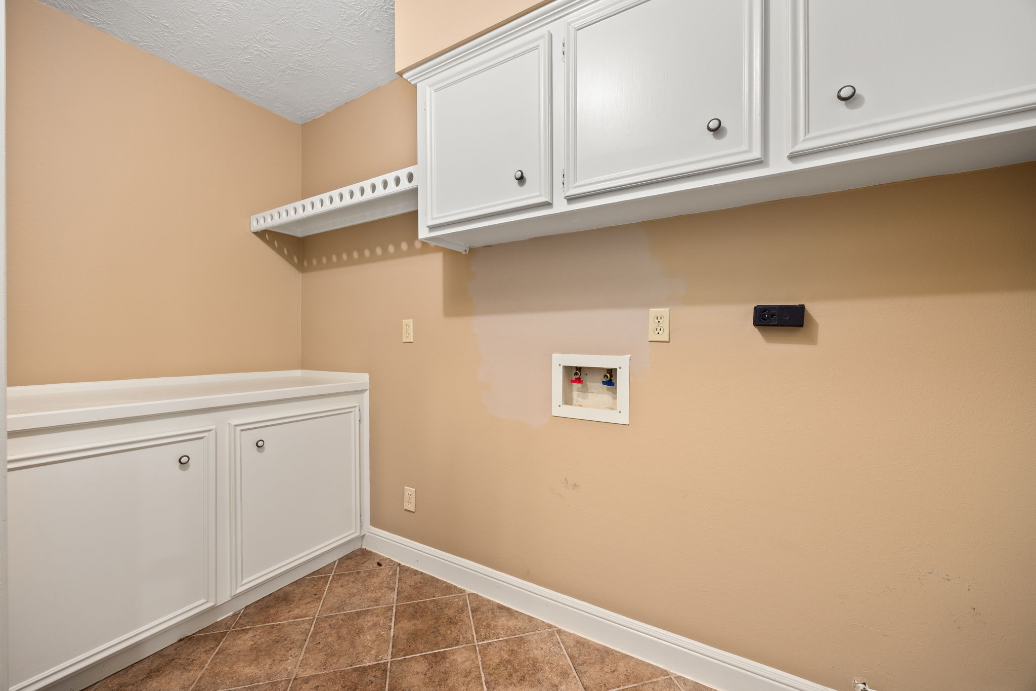 6623 Ampton Drive Spring, TX 77379 - Photo 18 of 45 A must have, extra large laundry room.