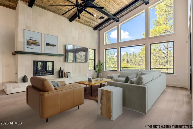 a kitchen with stainless steel appliances granite countertop a stove a refrigerator and a sink