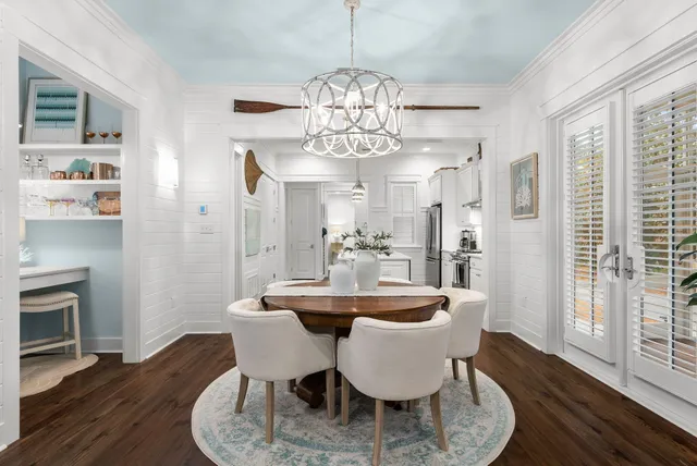 a view of a kitchen with furniture and a stove