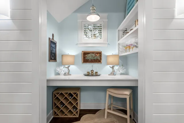 a kitchen with granite countertop a sink appliances and cabinets